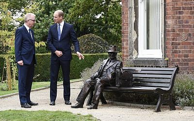 Prince William with local MP Ian Austin, next to the statue of Frank Foley.
