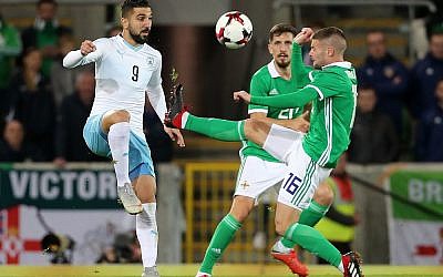 Israel's Moanes Dabour (left) and Northern Ireland's Oliver Norwood battle for the ball during the International Friendly at Windsor Park, Belfast. Photo credit should read: Liam McBurney/PA Wire