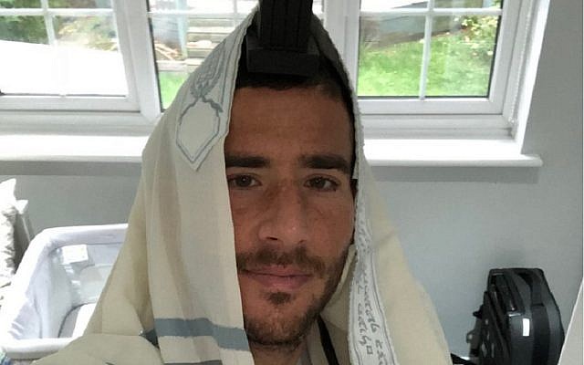 Tomer Hemed posted a picture of himself donning his tefillin this week