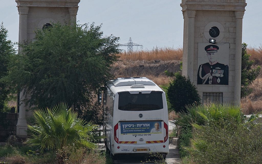 A Picture taken from the Israeli side of the border fence in Naharayim also known as Baqura, shows Israeli bus with tourists visiting the hill next to a Jordanian military outpost in the Jordan Valley in Northern Israel, on October 22, 2018. . Photo by: Ayal Margolin-JINIPIX