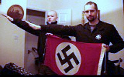BEST QUALITY AVAILABLE

Undated handout photo issued by West Midlands Police of a picture shown to jurors at Birmingham Crown Court, showing Darren Fletcher (right) who has admitted being a member of banned far-right terrorist group National Action, posing with alleged member Adam Thomas, as both give a Nazi-style salute. PRESS ASSOCIATION Photo. Issue date: Sunday November 29, 2015. See PA story COURTS FarRight. Photo credit should read: West Midlands Police/PA Wire

NOTE TO EDITORS: This handout photo may only be used in for editorial reporting purposes for the contemporaneous illustration of events, things or the people in the image or facts mentioned in the caption. Reuse of the picture may require further permission from the copyright holder.