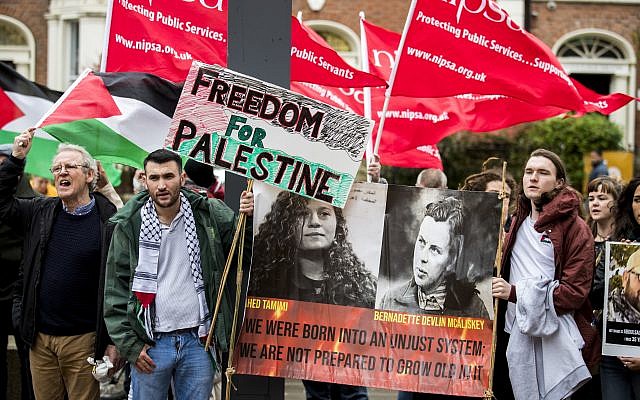 People protest outside Queen's University, Belfast, during the visit of Israeli ambassador to the United Kingdom Mark Regev.  Photo credit: Liam McBurney/PA Wire