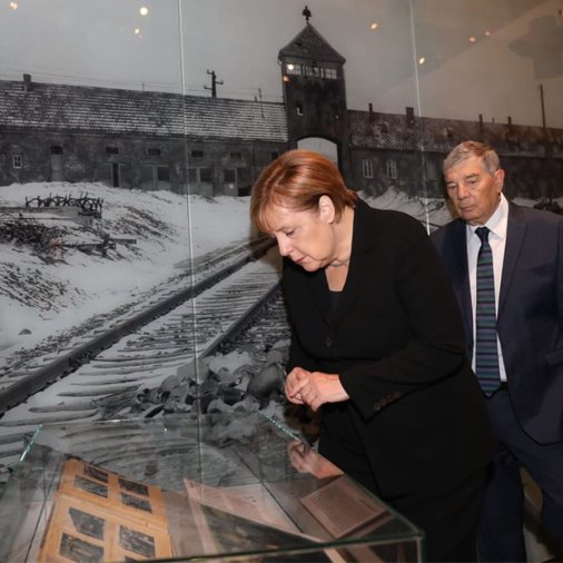 German Chancellor Angela Merkel during her state visit to Israel. Here she tours Israel national Holocaust memorial museum, Had Vashem. Credit: Had Vashem on Twitter