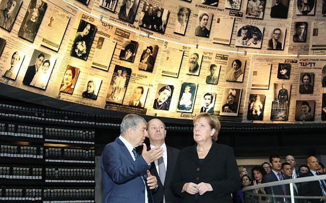 German Chancellor Angela Merkel during her state visit to Israel in 2018 touring Israel national Holocaust memorial museum, Had Vashem. Credit: Yad Vashem on Twitter