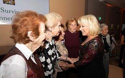 Elaine Paige meeting with Holocaust survivors during Jewish Care's event