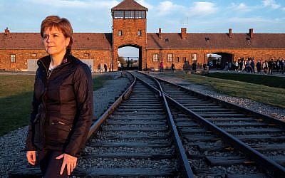 Nicola Sturgeon at Auschwitz, in front of the gate of death (Credit: Holocaust Educational Trust)