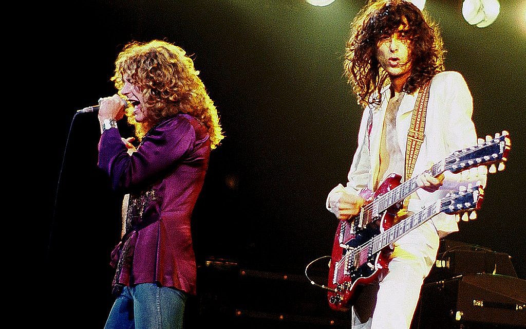 Led Zeppelin's Jimmy Page and Robert Plant performing (Wikipedia/Source	Contact us/Photo submission
Author: Jim Summaria http://www.jimsummariaphoto.com/ /Attribution-ShareAlike 3.0 Unported (CC BY-SA 3.0) / https://creativecommons.org/licenses/by-sa/3.0/legalcode)