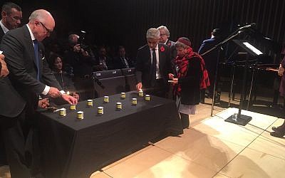 Sadiq Khan joins the American envoy to London in lighting 11 memorial candles at JW3