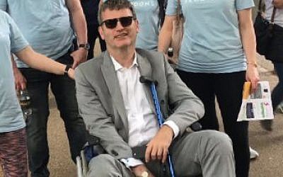 Mark Lewis during this the 2018 Al-Quds Day parade, which he temporarily halted in his wheelchair