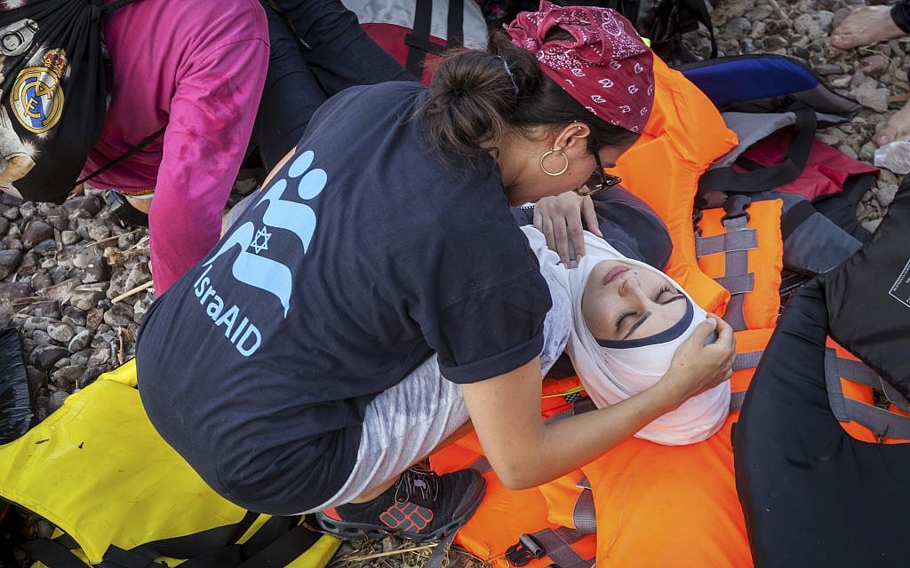Providing lifesaving care on the shores of Lesbos. Photo - Boaz Arad Providing lifesaving care on the shores of Lesbos. Photo - Boaz Arad
