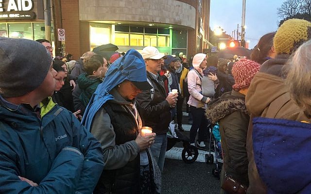 Thousands of people gathered for a vigil in the Squirrel Hill neighbourhood on Saturday night in honour of the victims