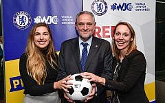 WJC CEO and Executive Vice President Robert Singer, center, with Seren Fryatt (right) and Alyssa Chassman (left), winners of the NY Pitch for Hope competition. (credit: Shahar Azran)