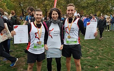 Daniel Bratt and Benjamin Radstone, pictured either side of WJR's new Community Engagement Officer Zara Kletz, ran for the charity