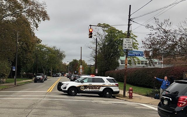 Police cordon off around the scene of Saturday's shooting