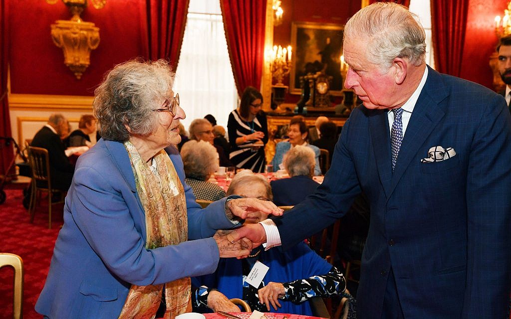 The Prince of Wales meets guest Dr Elizabeth Rosenthal, during a reception for the Association of Jewish Refugees in London, which marks the 80th anniversary of the Kindertransport. Photo credit: John Stillwell/PA Wire