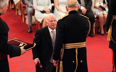 Sir Ben Helfgott receives his knighthood from the Prince of Wales at Buckingham Palace. Photo credit: Yui Mok/PA Wire