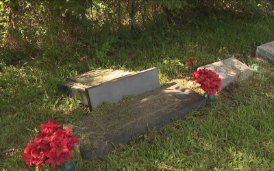 Screenshot of video showing toppled headstones in Texas