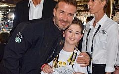 Rio Woolf, pictured with David Beckham