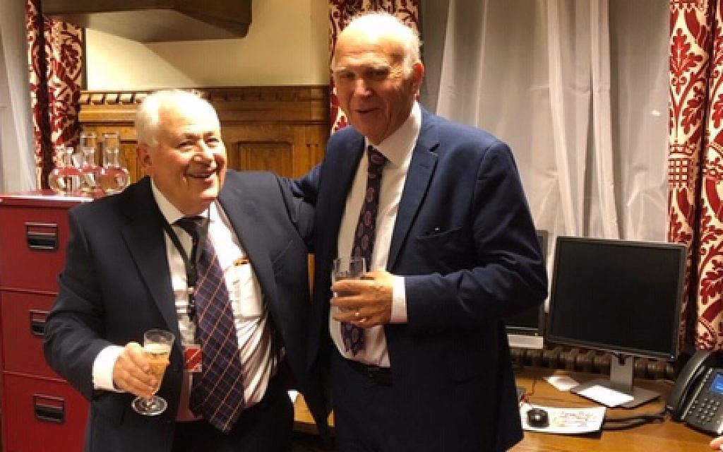 Lord Monroe Palmer, left, with party leader Sir Vince Cable