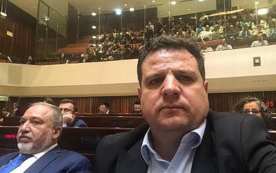 Aymen Odeh found himself next to Avigdor Lieberman