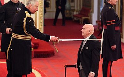 Sir Ben Helfgott is made a Knight Bachelor of the British Empire by the Prince of Wales during an Investiture ceremony at Buckingham palace, London.