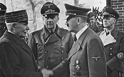 France’s WWI hero Marshall Phillippe Pétain  meeting Hitler, with whom his Vichy-based wartime government collaborated.