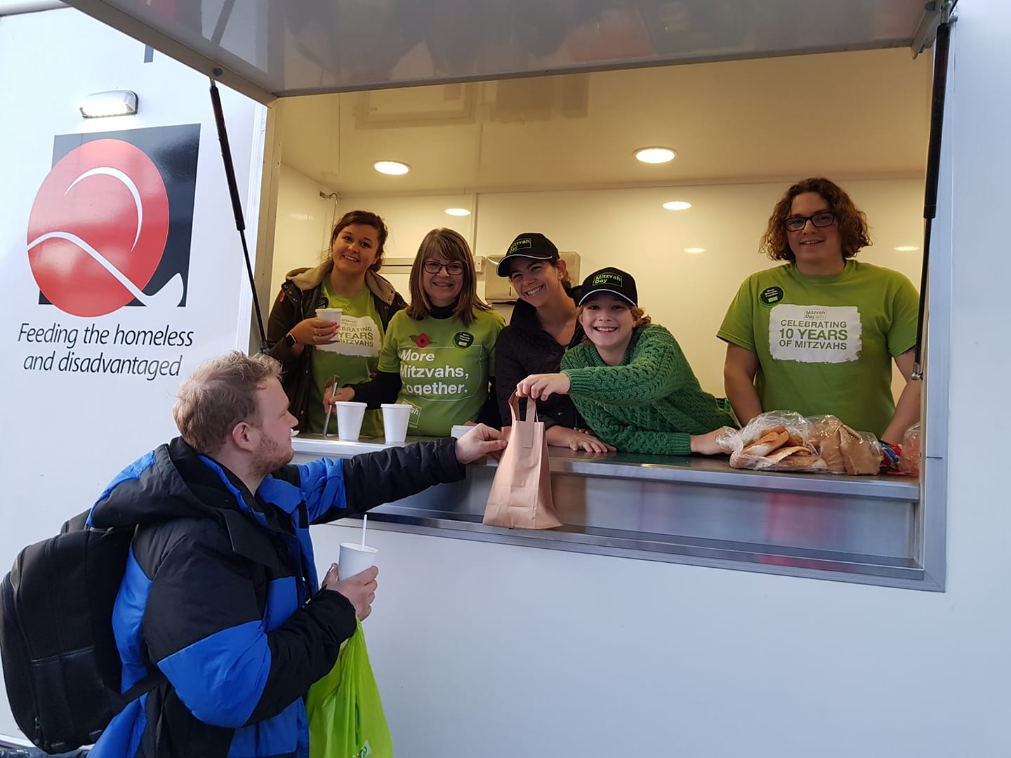 Peterborough Liberal Jewish Community serving their soup along with sandwiches to local homeless people