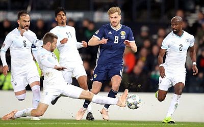 Scotland's Stuart Armstrong (second right) and Israel's Shiran Yeini (second left) battle for the ball when the two sides met in November 2018 (Jane Barlow/PA Wire.)