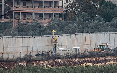 Picture taken from the Israeli Kibutz of Misgav Am, shows Israeli machinery operating near the border wall with Lebanon, destroying terror tunnels.  Photo by: JINIPIX