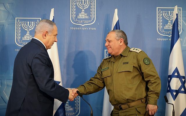 Israeli Prime Minister Benjamin Netanyahu shakes hands with Gadi Eizenkot  Photo by: JINIPIX