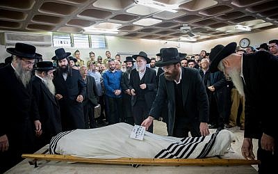 Comrades and relatives of killed Israeli soldier Yosef Cohen mourn during his funeral in Jerusalem on December 14, 2018..  Photo by: JINIPIX
