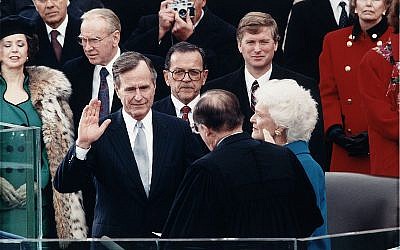 President George H. W. Bush during Inaugural ceremonies at the United States Capitol. January 20, 1989. Source: Wikimedia Commons. Credit: Library of Congress.)