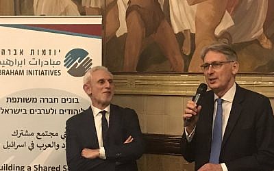 Alex Brummer (left) with chancellor Philip Hammond (right) at the Abraham Initiative dinner