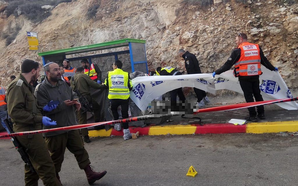 West Bank shooting attack which killed two. Medics and emergency workers at the scene: 
Photos courtesy Eliyahu Dahari/ZAKA