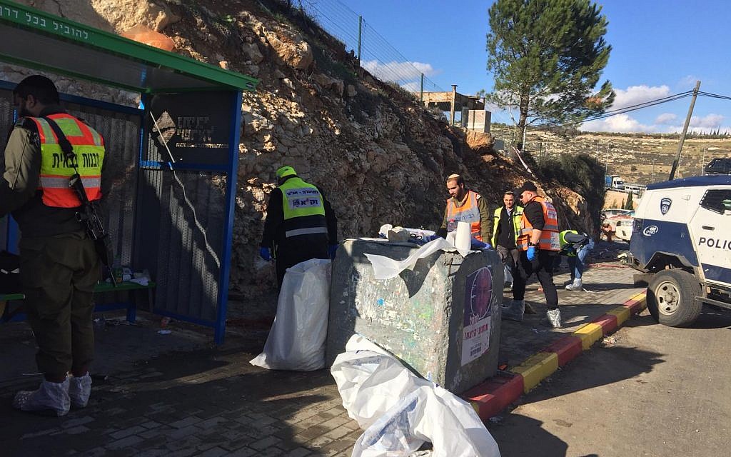 West Bank shooting attack which killed two. Medics and emergency workers at the scene: 
Photos courtesy Eliyahu Dahari/ZAKA