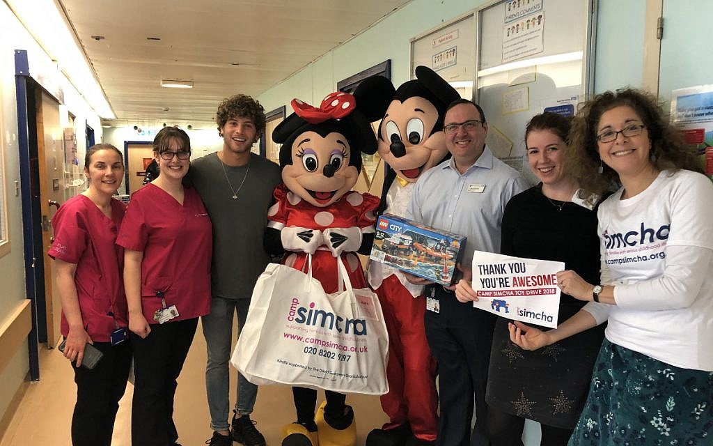 Love Island's Eyal Booker with Camp Simcha at the Royal Free for the charity's Toy Drive!