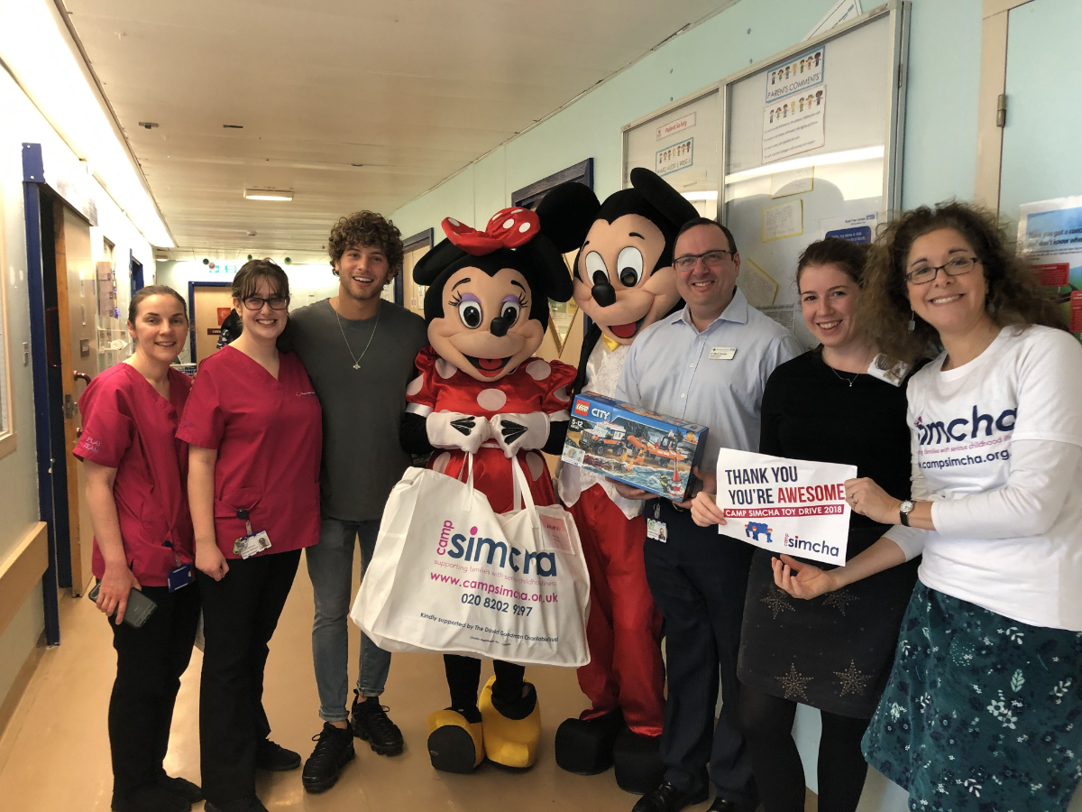 Love Island's Eyal Booker with Camp Simcha at the Royal Free for the charity's Toy Drive!