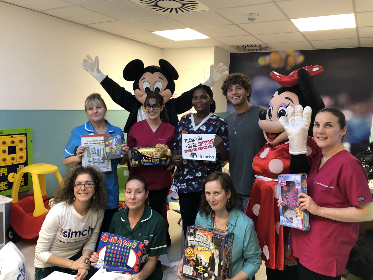 Love Island's Eyal Booker with Camp Simcha at the Royal Free for the charity's Toy Drive!