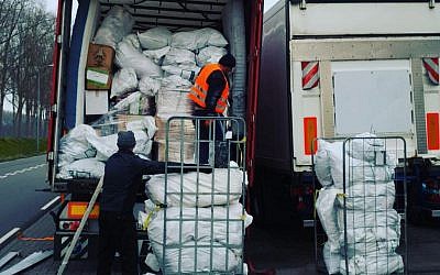 Packing lorries with gifts for refugees