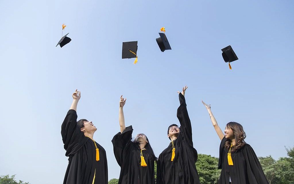 Students celebrating graduation