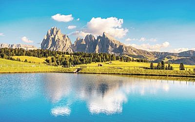 Lake and mountains at sunset, Dolomites Alps