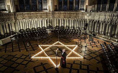Canon Chancellor Christopher Collingwood helped light six hundred candles at York Minster in memory of more than 6 million Jewish people murdered by the Nazis on HMD last year  Photo credit: Danny Lawson/PA Wire