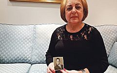 Faiza Saigh holding a photo of her brother, Daoud Ghali Yadgar Faiza Saigh holding a photo of her brother, Daoud Ghali Yadgar