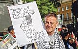 Anti-Israel protester makes his views known in central London  (Photo by Alex Cavendish/NurPhoto/Sipa USA)