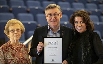 Adrian Packer (centre) with Dr Agnes Kaposi, who is a Holocaust survivor and who has participated in the Echo Eternal project (left), and TV presenter Natasha Kaplinsky (right)