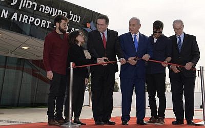 Bibi Netanyahu cuts the ribbon opening the new international airport. Source: Israeli PM on Twitter