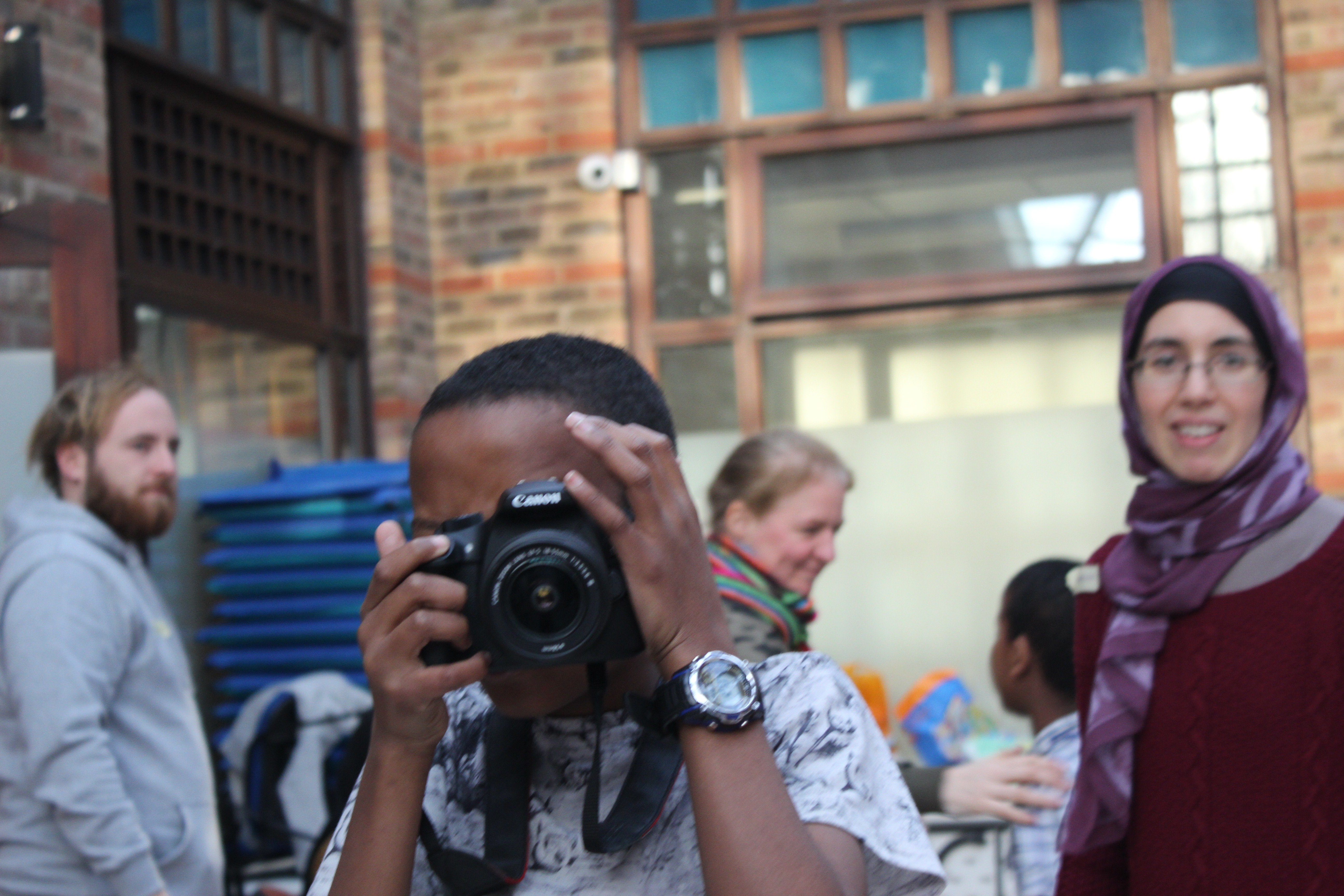 Say cheese! Young man takes a snap on a camp for children who were traumatised by the Grenfell disaster, run in-part by Jewish activists