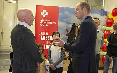 Yair Shahar (left) and his family meeting Prince William (Credit: Ian Vogler)