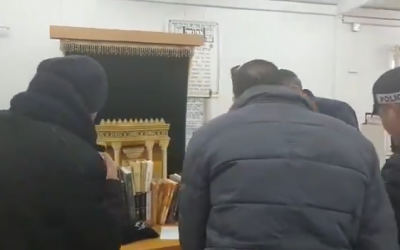 Video shows police raiding a yeshiva in the West Bank where students are accused of terrorism. (Credit: Screenshot from video by Honenu, which provides legal aid to Israeli soldiers and civilians in distress)
