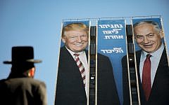 An election campaign billboard of the ruling Likud party reading 'Netanyahu is a different league' shows Israeli Prime Minister Benjamin Netanyahu (R) and US President Donald Trump (L) shake hands at the entrance to Jerusalem.. Photo by: JINIPIX An election campaign billboard of the ruling Likud party reading 'Netanyahu is a different league' shows Israeli Prime Minister Benjamin Netanyahu (R) and US President Donald Trump (L) shake hands at the entrance to Jerusalem.. Photo by: JINIPIX